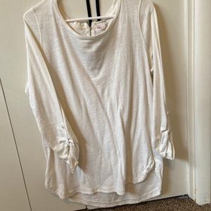 Quarter length sweater with zipper accent piece